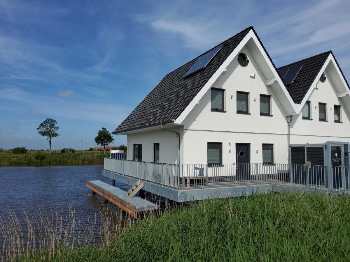 Nr 110 - Ferienhaus Seeperle Pfahlhaus Auf Der Harle Carolinensiel Exterior photo